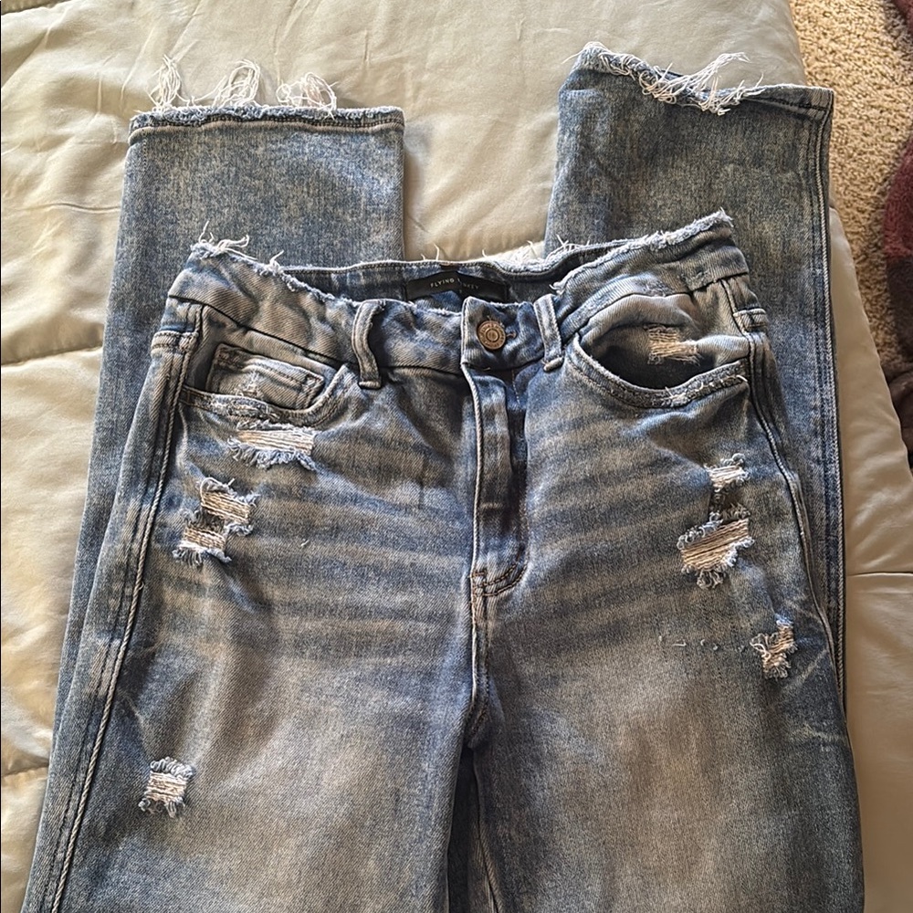 Distressed Blue Denim Jeans